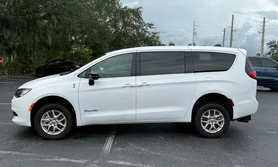 2025 Chrysler Voyager LX wheelchair accessible van Orlando, white exterior side view