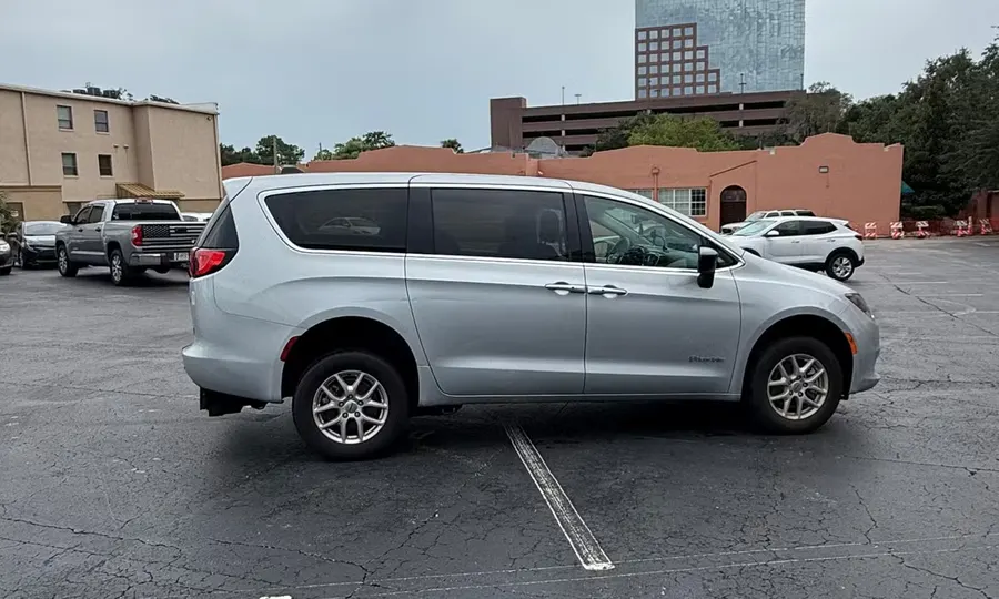 2024 Chrysler Voyager wheelchair accessible van Orlando, silver passenger-side exterior view