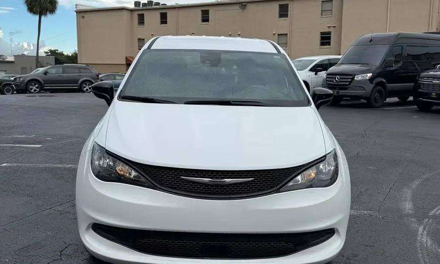 2025 Chrysler Voyager LX wheelchair accessible van Orlando, white front exterior view